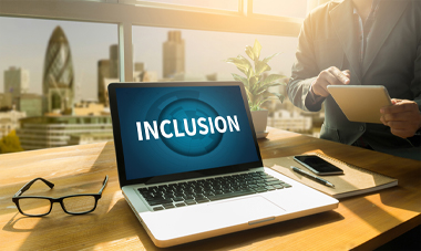 Laptop with the word Inclusion